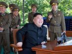 North Korean dictator GRINS as fighter jet DESTROYS enemy aircraft in war games