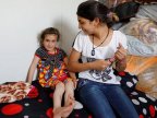 Kidnapped Iraqi girl REUNITED with family after THREE years (VIDEO)