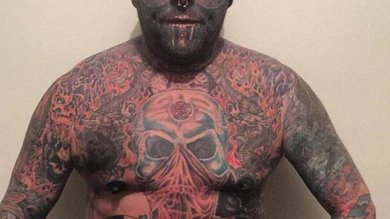 Meet the ink-addict covered HEAD-TO-TOE in $100,000 worth of tattoos including one on his EYEBALL (PHOTO/VIDEO)