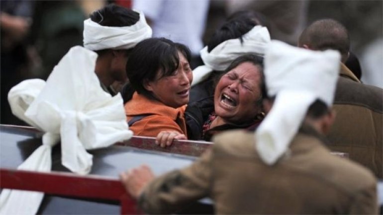 China landslide: More than 100 missing as search continues