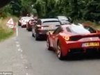 Is this the world's most expensive traffic jam? Stunned lorry driver spots 36 Ferraris worth a total of £7.2M queuing up at temporary lights