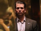 Trump son met Russian lawyer for damaging material on Clinton 