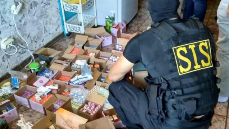 Anabolic pills, weapons and large cash seized by SIS. Superlab, like in Breaking Bad