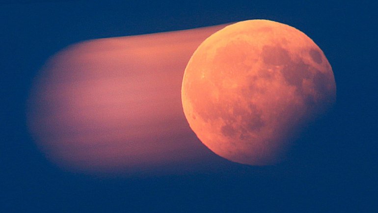 Stunning moon turns blood red during partial lunar eclipse across Europe 