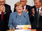 Merkel gets a fourth term but German voters deliver far-right surge