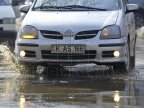 Drivers and pedestrians are urged to be careful as rain made roads slippery 