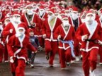 Motorcyclists dressed up as Santa Clauses parading to cheer up capital 