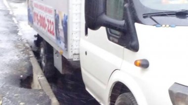 Driver from Capital found his car swallowed by asphalt