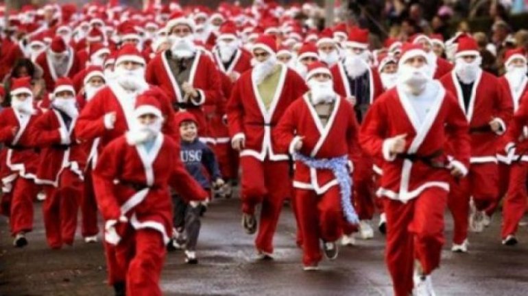 Motorcyclists dressed up as Santa Clauses parading to cheer up capital 