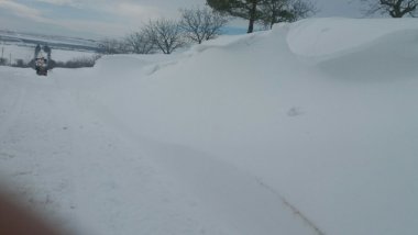 Road workers clean local highways and roads. In Criuleni snow is one meter high 