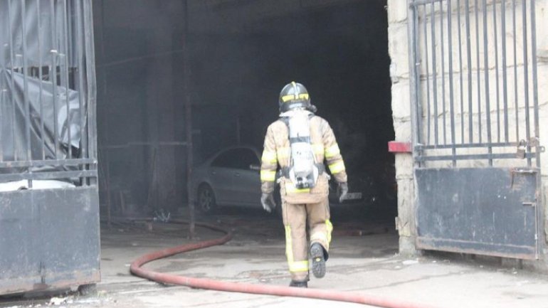 National hotel is on fire. Firemen and police are already there