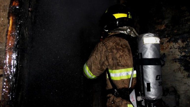 National hotel is on fire. Firemen and police are already there