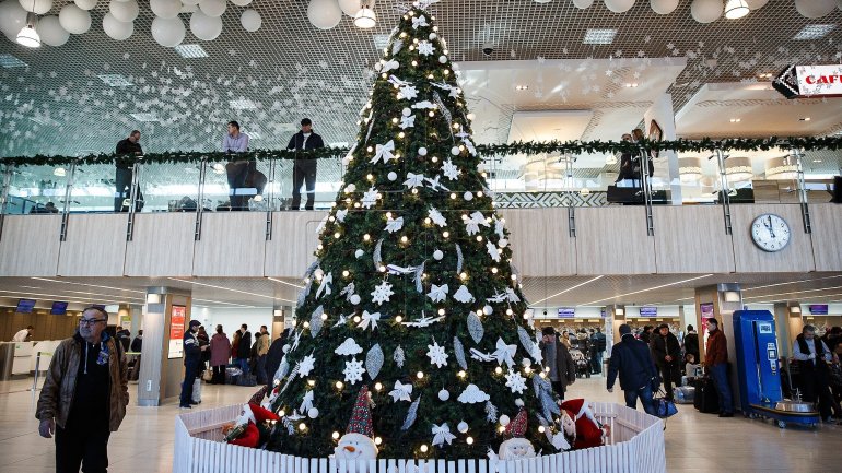 Christmas spirit at Chișinău International Airport. People are met with gifts and carols