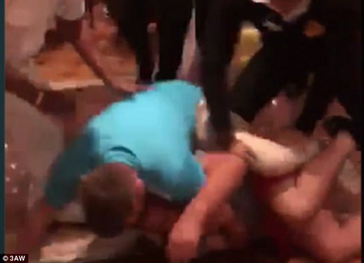 Relaxing cruise was reduced to bloody chaos as two warring families began beating each other