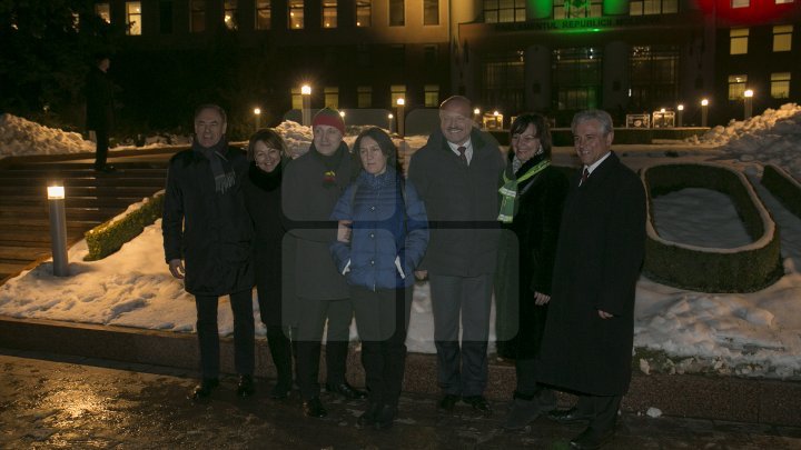 Lights spectacle in the square of Moldovan Parliament. Building was illuminated in Lithuanian flag colors