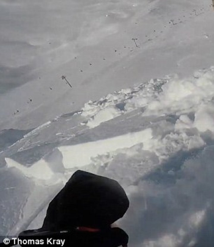 Heart-stopping moment! Snowboarder caught in an avalanche but survives after activating safety airbag 