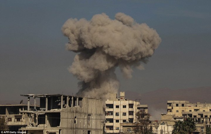 Horrifying footage from the rebel-held enclave of Eastern Ghouta in Syria shows women and children running for their lives as dust settles after yet another government air strike