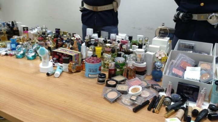 A Moldovan and two colleagues caught stealing perfumes from a duty free shop in Italy