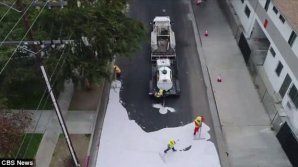 Los Angeles begun reducing effects of climate change by painting some streets in a heat-reducing sealcoat