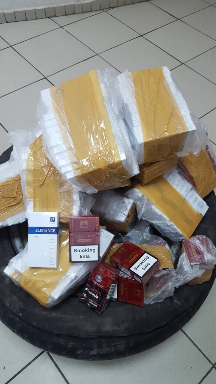 Guns and undeclared cigarettes found at customs. Where did smugglers hid the goods?