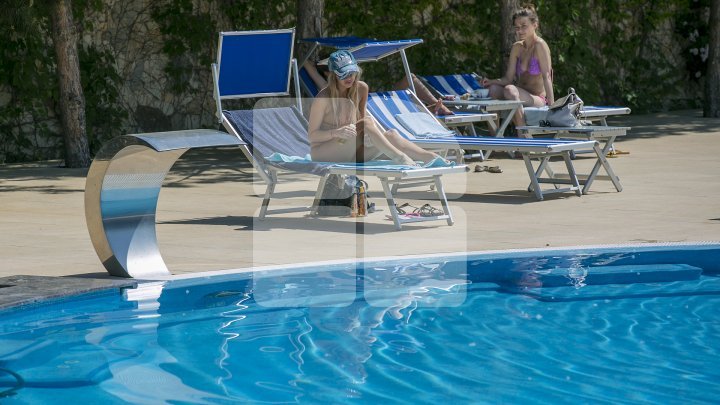 Summer season started. Sexy girls and good looking men at pools from Capital