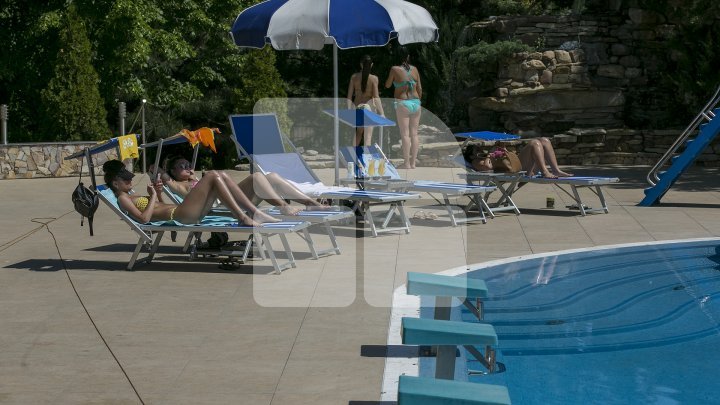 Summer season started. Sexy girls and good looking men at pools from Capital