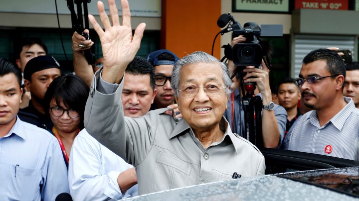 Malaysians wake up to new political landscape as opposition wins