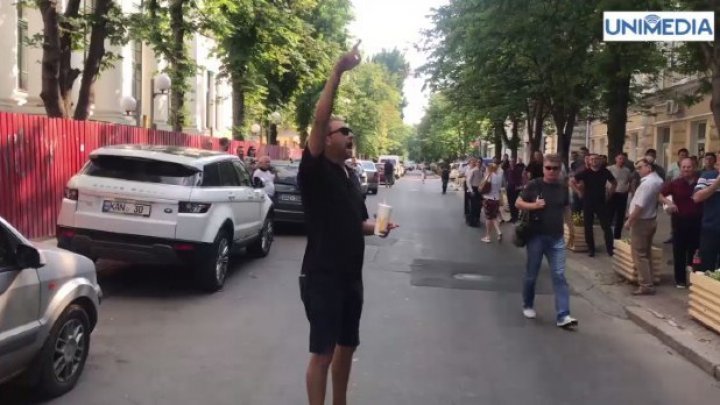 Who was aggressor toward protesters in front of Russian Embassy 