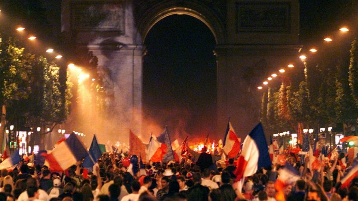 French football fans celebrate win in WC semi-final at the Champs Elysee