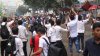 Protesters in Dhaka demanding safer streets face police firing tear gas