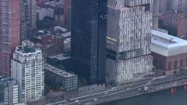 NY police investigates incidents in which gunshots were fired at a luxury apartment building in Manhattan