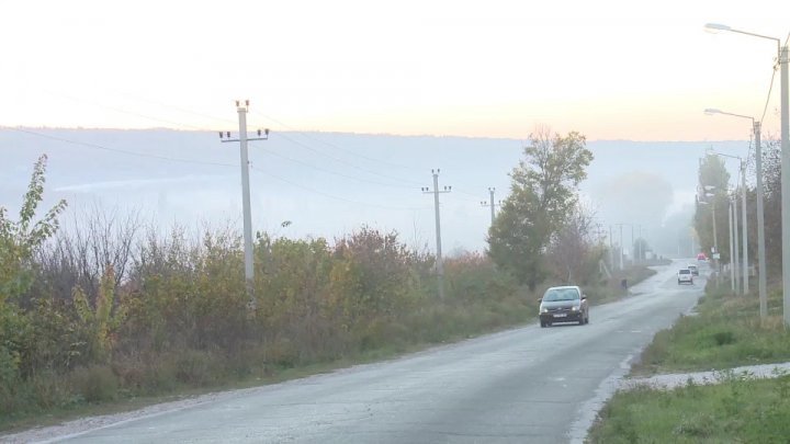Apocalyptic landscape in Truseni. A dense smoke has covered the village after people have set fire to dry leaves