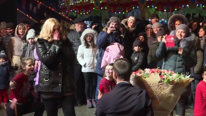 She said YES. Young couple from Capital engaged at the Christmas Fair