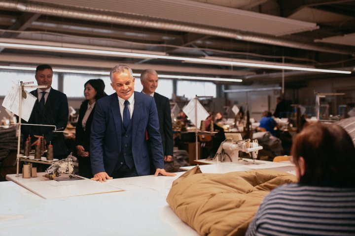 Vlad Plahotniuc met employees from a factory which makes clothes for EU soldiers