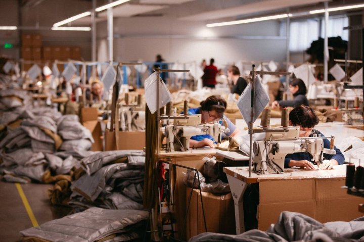 Vlad Plahotniuc met employees from a factory which makes clothes for EU soldiers