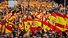 Thousands of protesters packed Madrid in a fierce backlash against Spanish Prime Minister and his planned talks with Catalan separatists