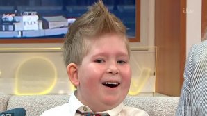 Such miracle! British boy born with 2% of brain learns how to count and surf 