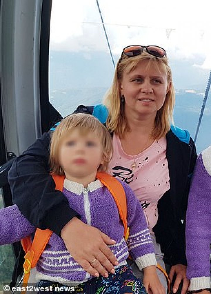 Terrifying moment four-year-old girl fell unconscious after her hoodie caught on climbing frame and tightened around her neck in Russia