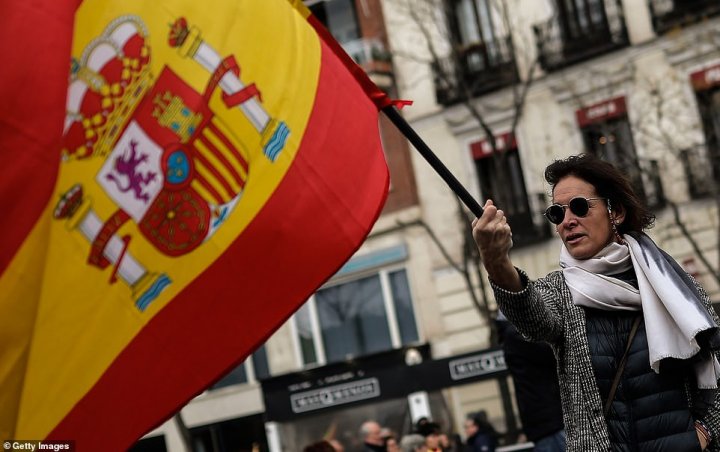 Thousands of protesters packed Madrid in a fierce backlash against Spanish Prime Minister and his planned talks with Catalan separatists