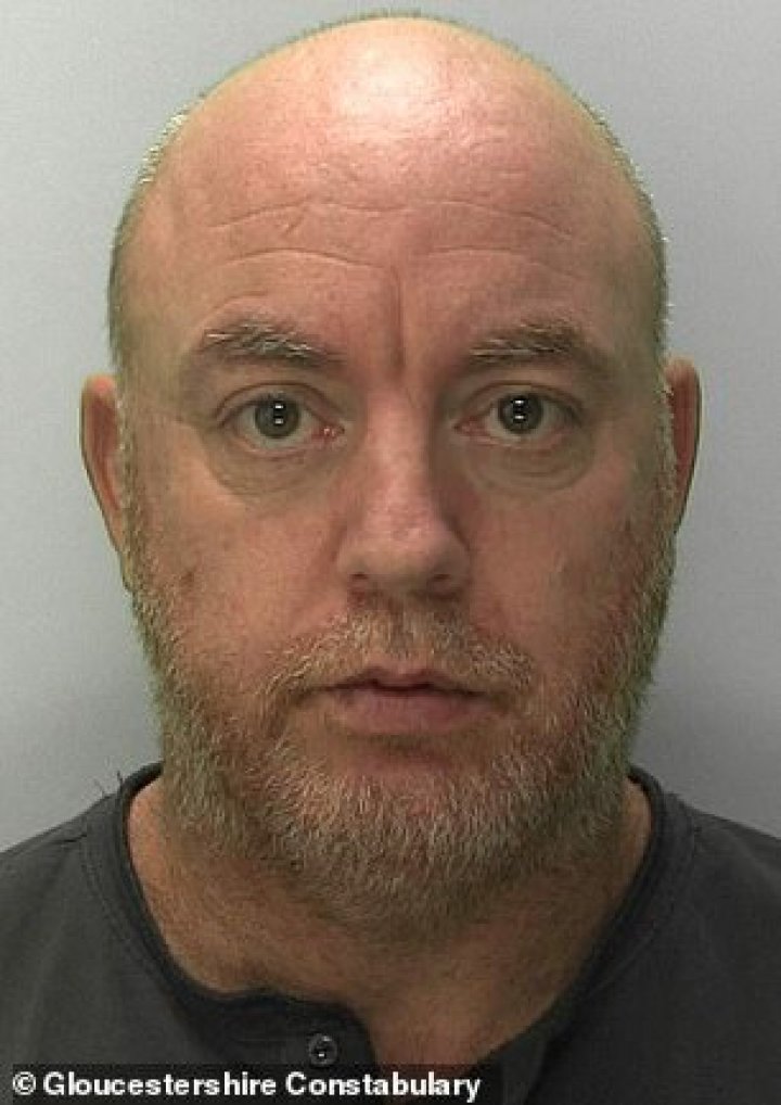 Police launch urgent manhunt for shaven-headed inmate, 47, who was released from prison by MISTAKE