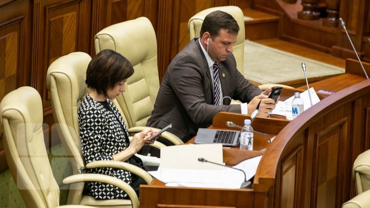 Maia Sandu is an unrelated MP. At least this information is shown in the Republic of Moldova's Parliament site