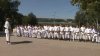 Dozens of karate fighters hold an outdoor training in Capital park 