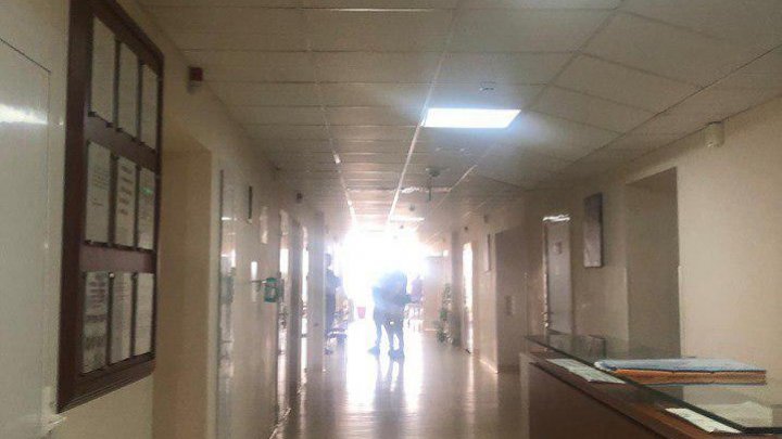 Reghina Apostolova, guarded by CNA officers at the hospital (PHOTOS)