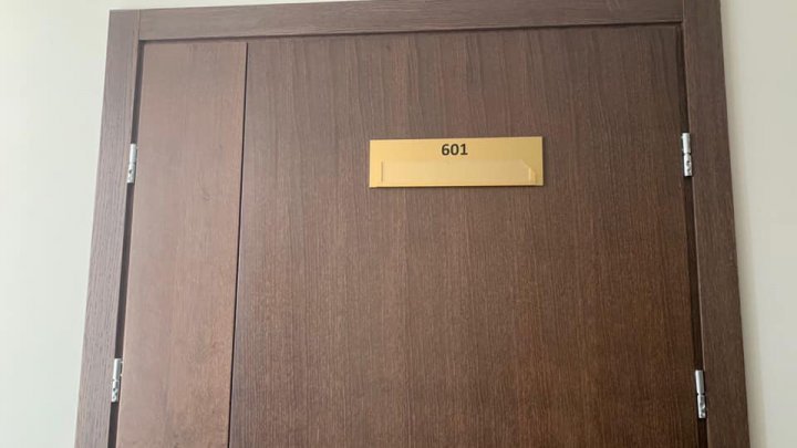 Names of Marina Tauber and Reghina Apostolova removed from their office door in Parliament 