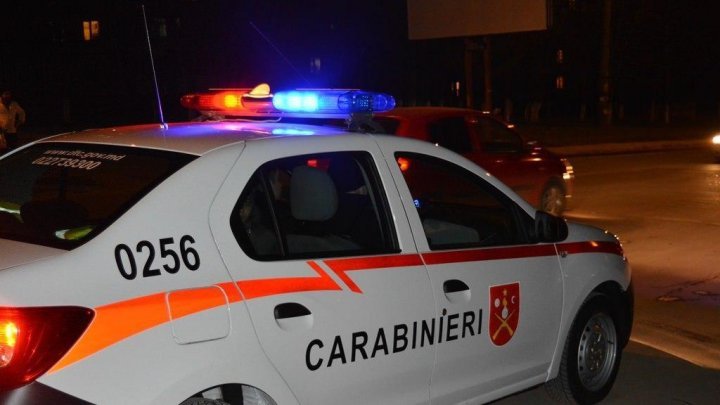 Carabinieri about two kids walking alone on Chisinau street at night 