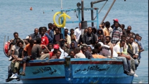 Franţa va primi, cu titlu excepţional, imigranţi tunisieni