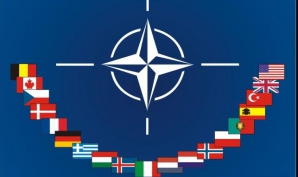 NATO se va implica în războiul din Libia, dar cu o condiţie