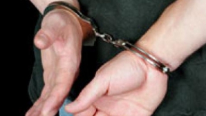 Directorul unei şcoli auto, reţinut pentru trafic de influenţă 