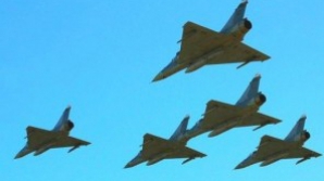 Italia trimite avioane în Libia