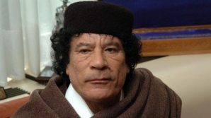 Un fost ministru francez vrea să fie avocatul lui Gaddafi